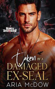 Taken By A Damaged Ex-SEAL by author Aria McDow. Book cover.
